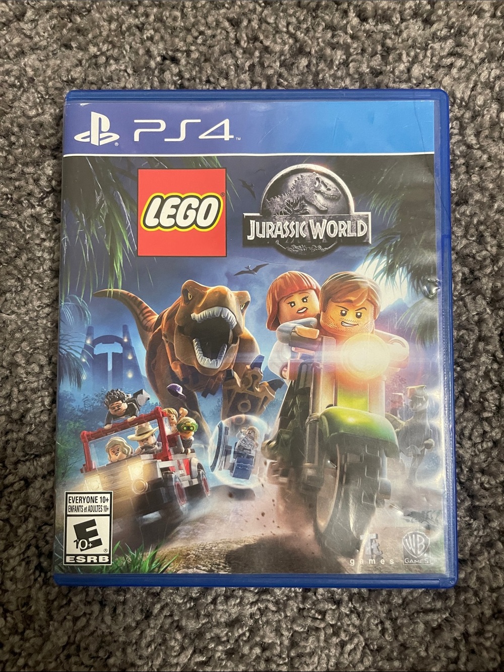 Lego Jurassic World PS4 Game - Blue Case with Colorful Cover Art